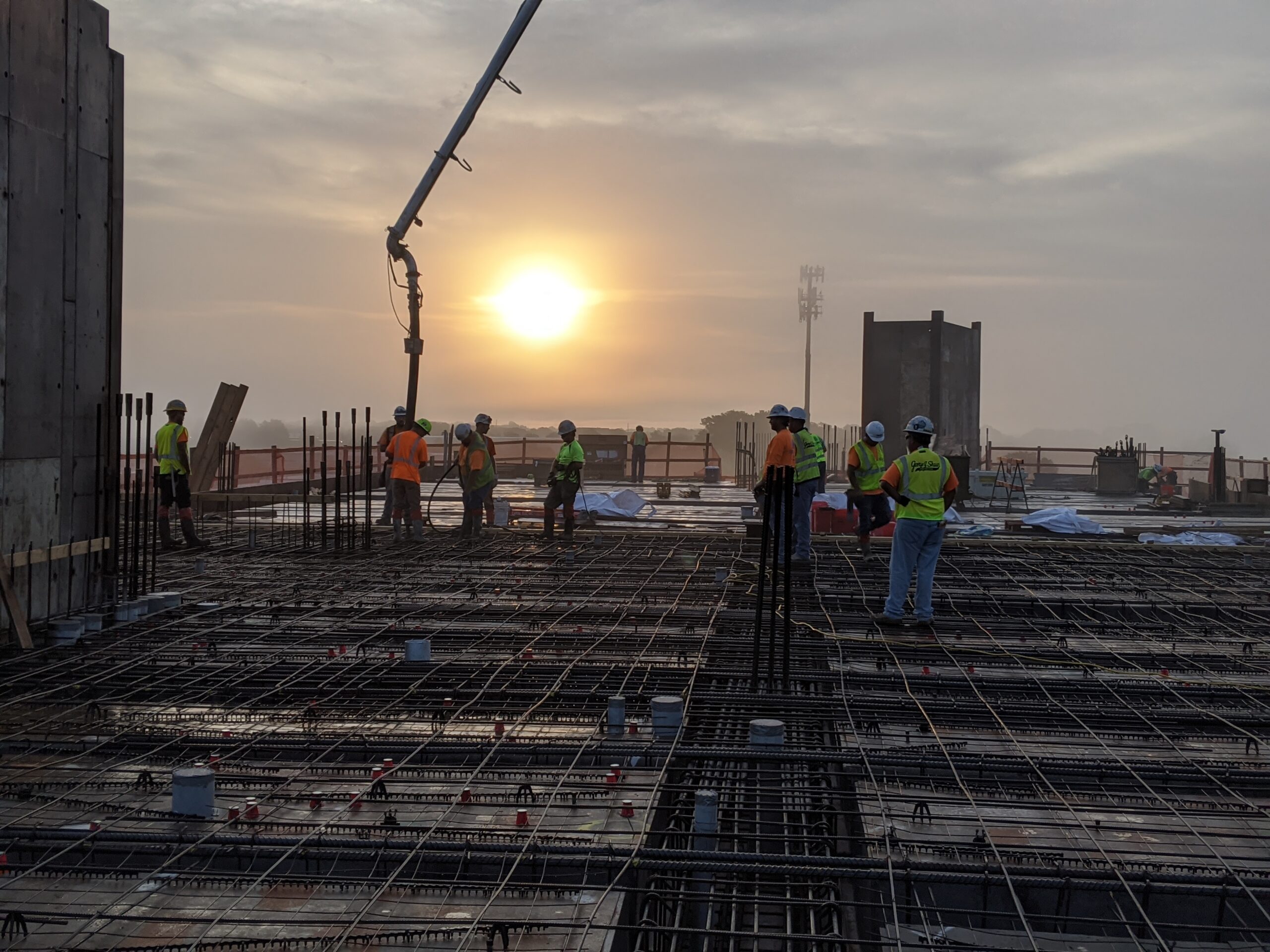 Construction Crew Pouring Concrete